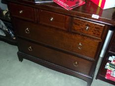 A dark wood stained 5 drawer chest, Height 71cm, width 82cm, depth 47cm COLLECT ONLY