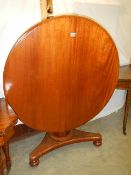 A Victorian mahogany circular tip top centre pedestal table. COLLECT ONLY.