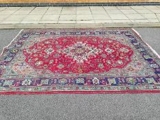 A large Persian carpet 100% wool pile (240cm x 335cm), COLLECT ONLY