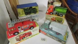 Four Dinky's in good condition, in original boxes. 285 fire engine, 978 refuse wagon,