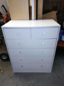 A white melamine chest of drawers (75cm x 40cm x height 93cm), COLLECT ONLY