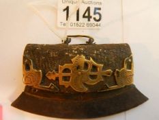 An early 19th-century leather and bronze? purse.