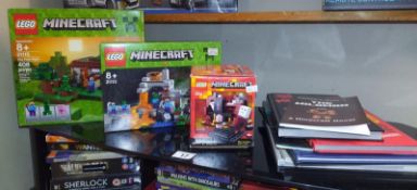 3 boxed sealed Lego Minecraft sets 21113, 21106 and 21115 and selection of Minecraft books etc