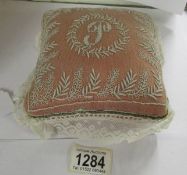 A French hand made Valenciennes lace and silk 'Boudoir' pin/hat-pin cushion,