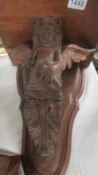 A carved oak wall bracket carved with an angel. COLLECT ONLY.