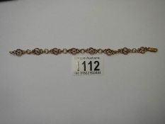 A 9ct gold fancy rope link bracelet, (tests as 9ct), 9 grams.