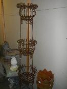 A wrought iron plant stand, COLLECT ONLY.
