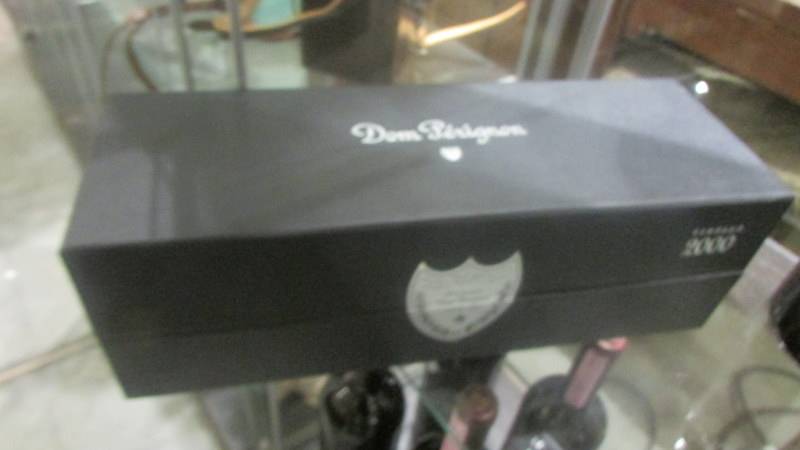 A boxed (unopened) 2000 bottle of Dom Perignon champagne and a bottle of Dom Perignon Rose' (1996). - Image 3 of 3