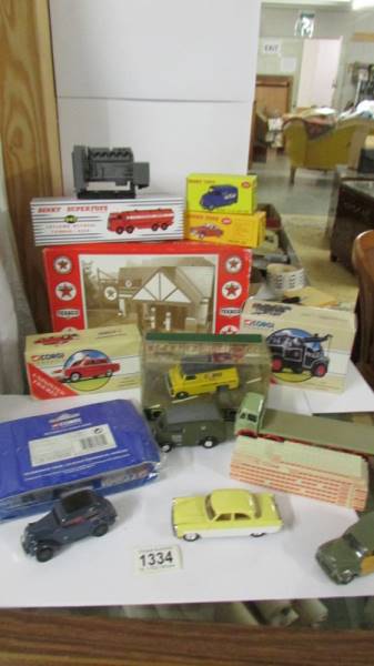 A selection of Corgi Classics, Atlas Dinky, some unboxed including a Texaco Service station.
