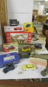 A selection of Corgi Classics, Atlas Dinky, some unboxed including a Texaco Service station.