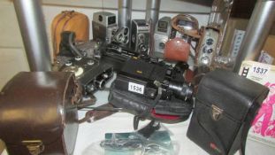 A mixed lot of vintage cine camera's - Bell & Howell Autoset AK8, Eumig C3, Elmo Cine and others.
