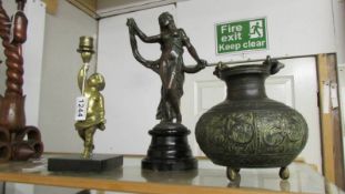 A bronze female figure, a bronze oriental pot and a brass cherub candlestick.