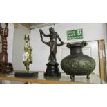 A bronze female figure, a bronze oriental pot and a brass cherub candlestick.