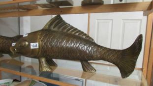 A large bronze Koi carp, 58 cm long and 27 cm high.