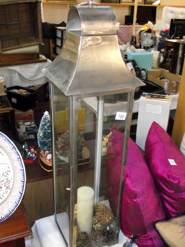 A large pillar candle holder, height 96cm COLLECT ONLY