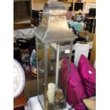 A large pillar candle holder, height 96cm COLLECT ONLY