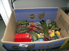 A collection of military diecast and quantity of play worn diecast including Corgi and Matchbox