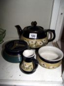 A lead glazed 3 piece tea set (sugar bowl a/f) and a tobacco jar