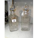 A pair of good quality cut glass decanters