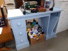 A blue painted pine desk (110cm x 51cm x height 77cm) (shelf brackets missing for the shelves on