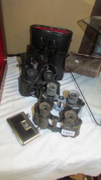 Six pairs of binoculars.