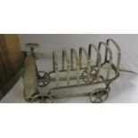 A rare art deco silver plated toast rack in the form of a lorry.