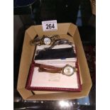 A ladies marcasite watch and 2 others