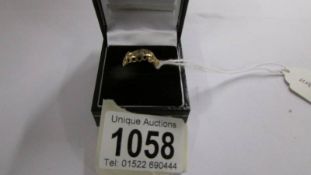 An 18ct gold ring set diamonds, size L. 3.3 grams.