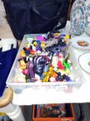 A box of plastic toy figures including Disney Mickey Mouse, Star Wars & Turtles etc.