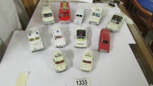 A selection of Dinky and Corgi police and fire vehicles.