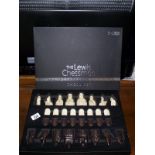 A boxed National Museum of Scotland 'The Lewis Chessmen' chess set (box is slightly a/f)
