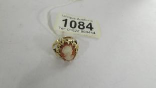 A vintage 9ct gold cameo ring set with a female profile, size J. 3.7 grams.