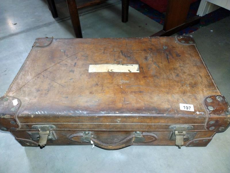 A large early leather suitcase (missing brass plaque on lid) - Image 2 of 10