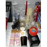 A selection of candle holders and candles, including candelabra, tea light stand etc