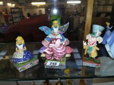 4 Disney traditions Alice in Wonderland figures