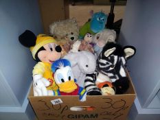 A box of soft toys including Mickey Mouse, Buzz Lightyear etc