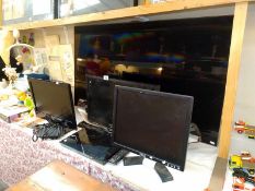 A quantity of flat screen TV's & computer monitors, all untested, some without leads & remotes