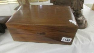 A mahogany jewellery box.