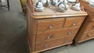 A Victorian pine chest of drawers with splash back and glass handles, 93 x 47 x 84 cm high,