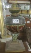 A Victorian brass oil lamp base.