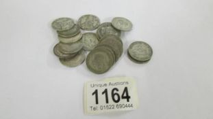 Twenty pre 1946 silver one shillings pieces, 112 grams.
