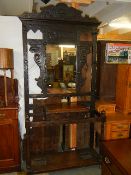 A carved oak hall stand. COLLECT ONLY.