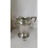 A large silver plate jug marked Nickel Silver, silver plated, 429-67.