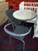 A mosaic top garden table and 2 chairs height and diameter of table (73cm x 70cm), COLLECT ONLY