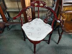 A decorative Chinese lacquered chair. COLLECT ONLY