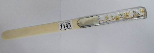 A Victorian ivory letter opener with glass handle decorated with birds and flowers. A/F