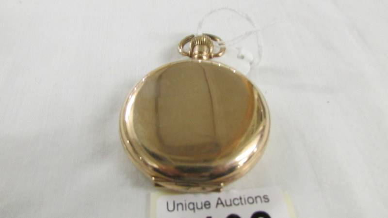 A gold plated full hunter pocket watch marked Dennison Watch Case Co., Ltd., In working order. - Image 2 of 5
