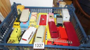 A selection of repainted Dinky and Corgi die-cast toys mostly in reproduction boxes.