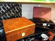 An Angelo walnut cigar humidor and 1 other, both boxed and as new