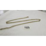 An extra long 9ct gold chain, 140 cm, 25.4 grams.